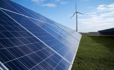 Solar pannels and wind power plant outside